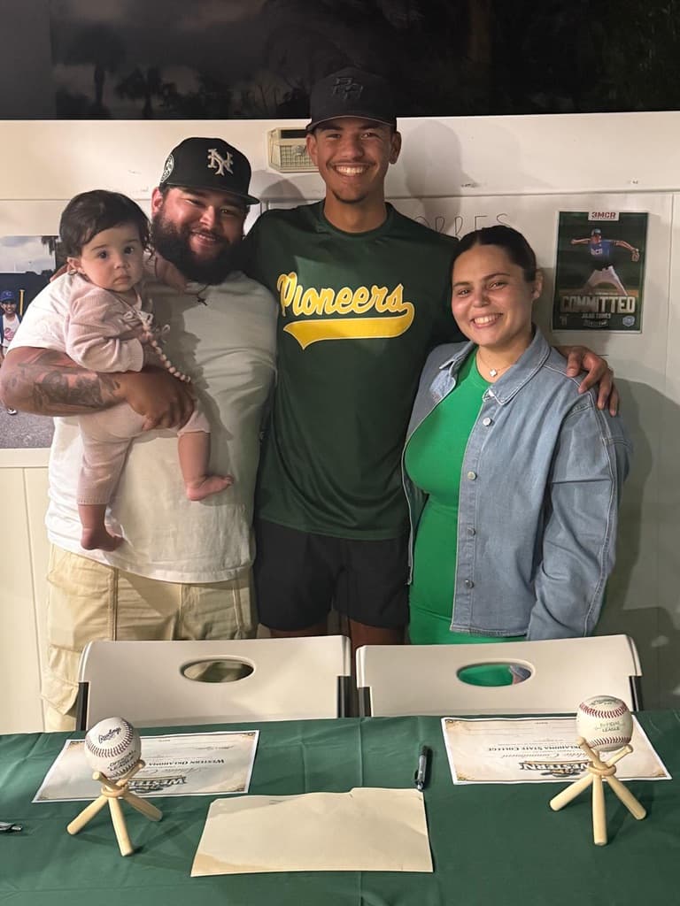 Julius Torres · Signing day with family